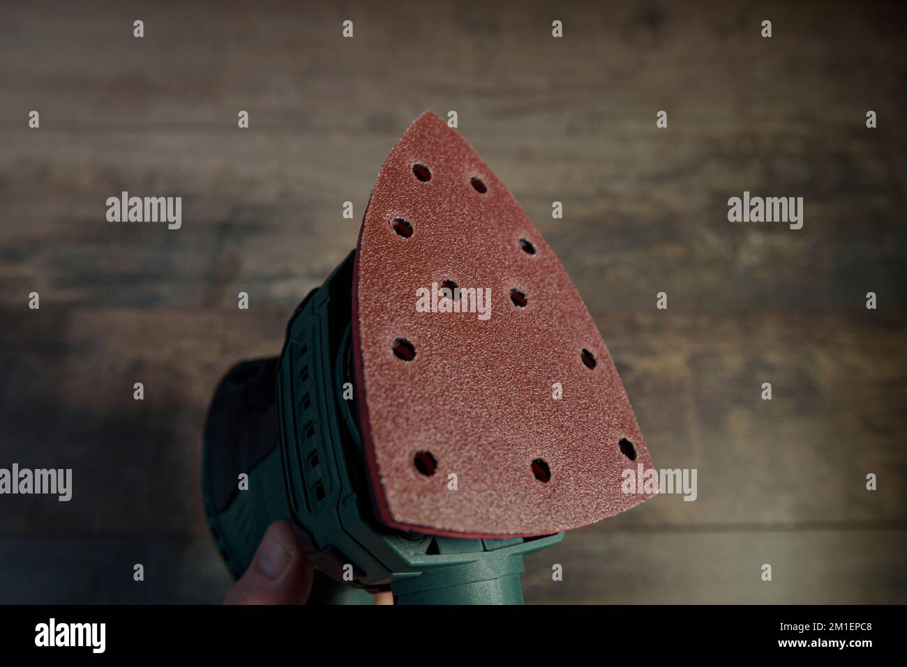 New sanding paper attachment for handheld electric sander Stock Photo