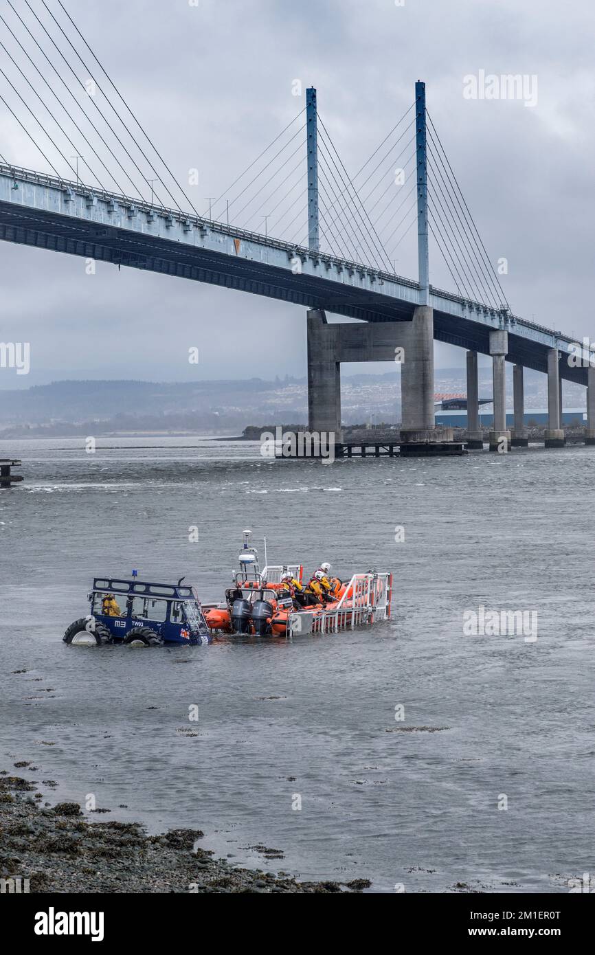 Practice tractor launch of the North Kessock Lifeboat, from the lifeboat station slipway, under the Kessock Bridge, Black Isle, Ross-shire. Stock Photo