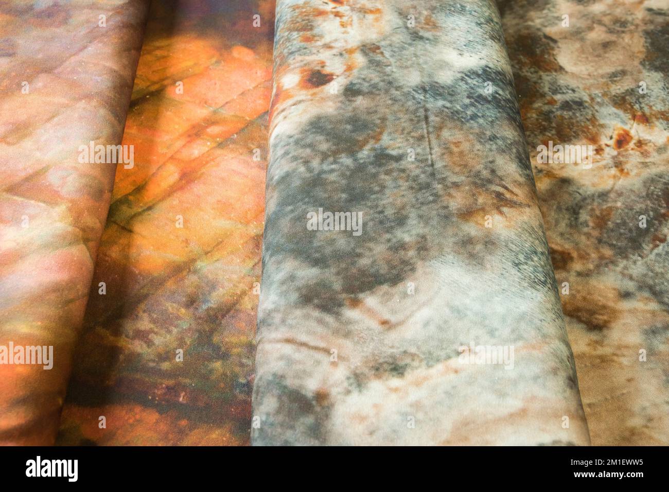 Viscose fabric sample in different color patterns closeup as textile background Stock Photo