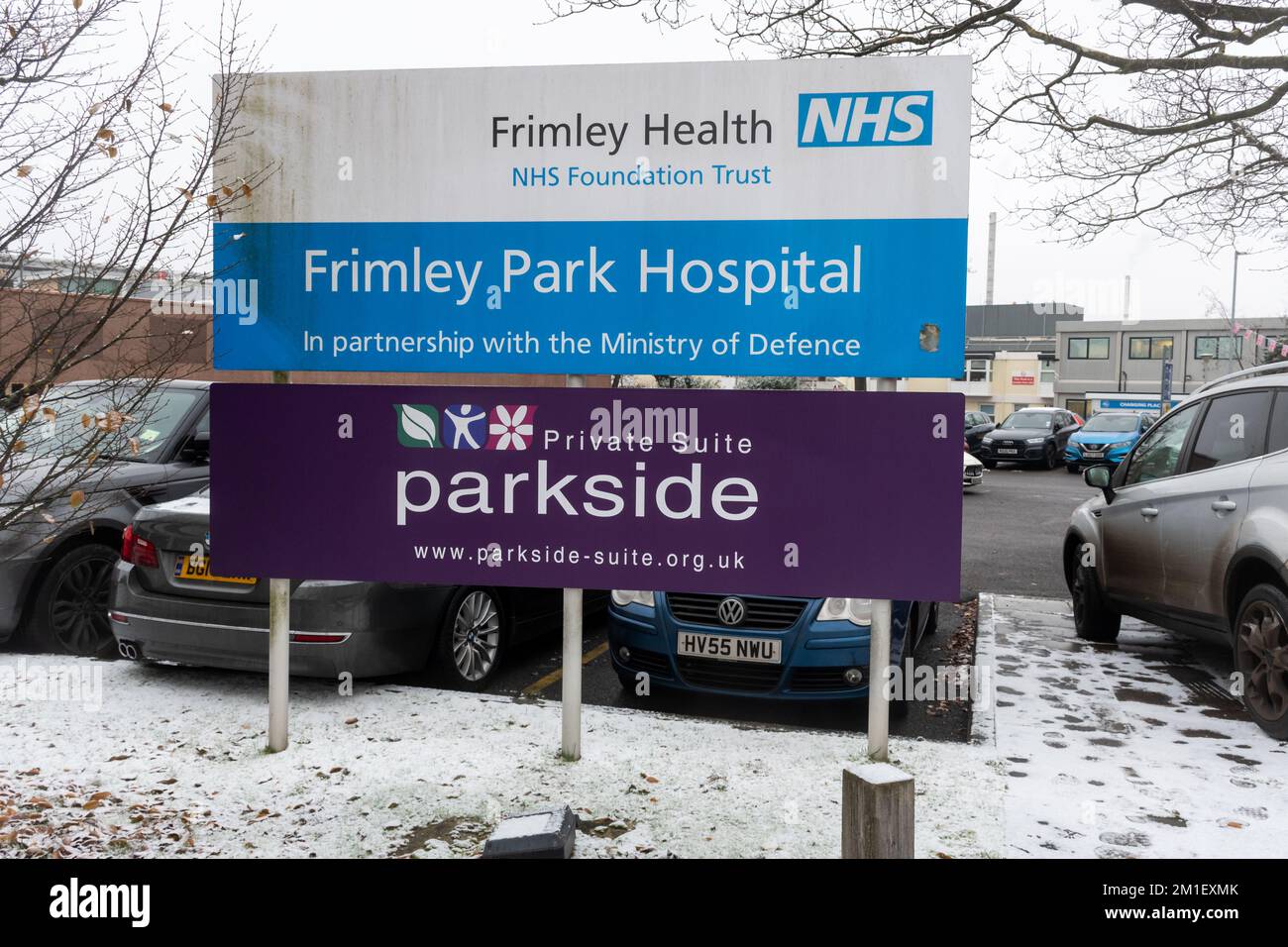 December 12th, 2022. Frimley Park Hospital in winter with snow, Surrey, England, UK. The NHS is struggling this winter with staff shortages, huge pressure on hospital beds, and the upcoming nurses strikes which are due to start this week. There is a huge backlog of patients waiting for operations and treatment, and high numbers of winter infections such as flu, covid-19 and RSV are expected. Stock Photo