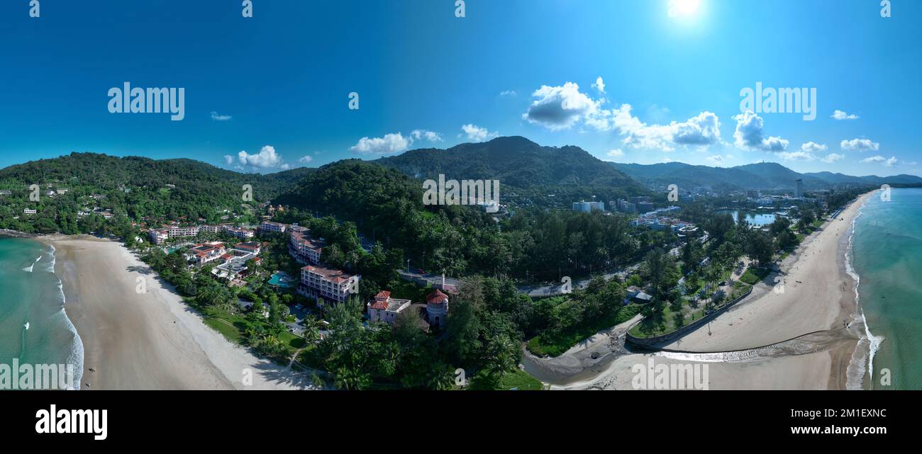 Panorama mountains view with sea surface water background,Amazing sea beach and mountains range,Aerial flying drone view tropical ocean in Phuket isla Stock Photo