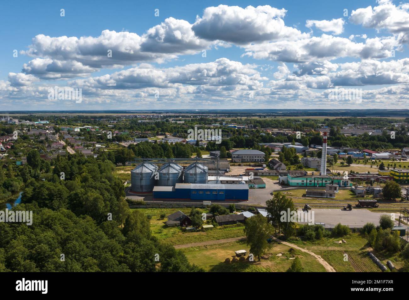 aerial view of a huge agro-industrial complex with silos and grain ...