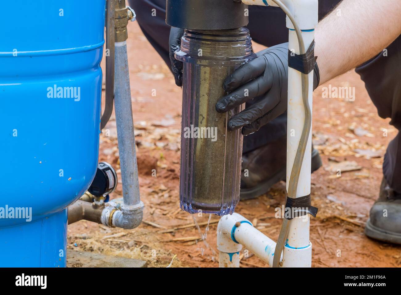 Professional worker perform maintenance on equipment including