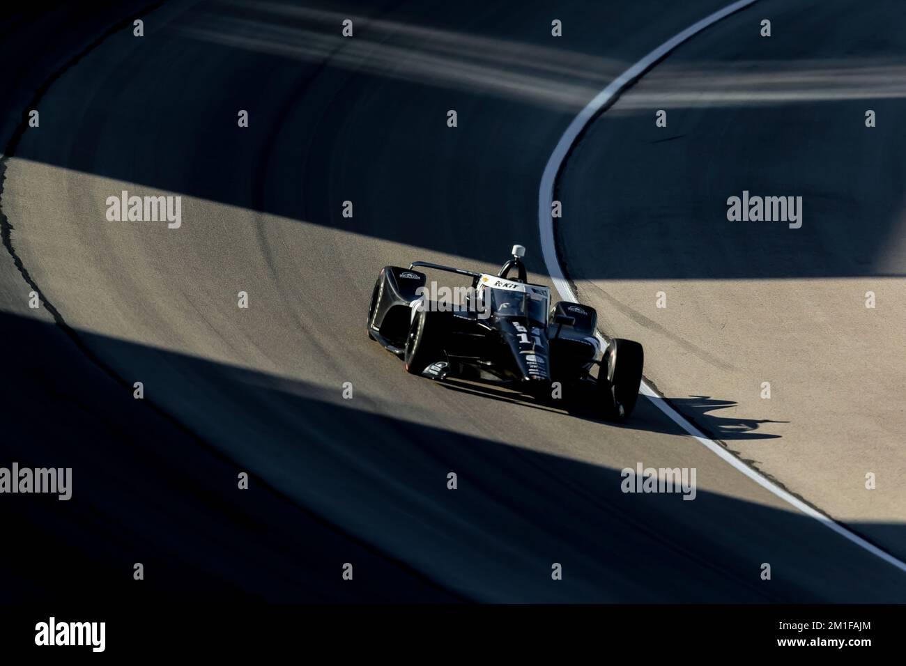 JR HILDEBRAND (11) of the United States races through the turns during