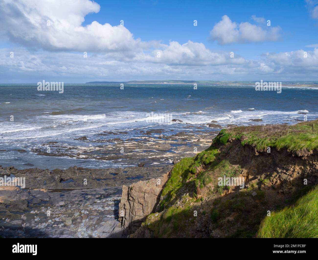 Bideford Bay from the cliffs at Westward Ho! with Baggy Point beyond, North Devon, England. Stock Photo