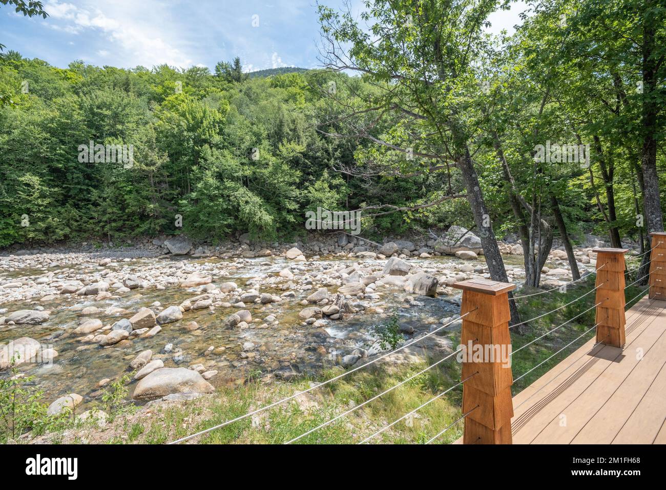 A contemporary and rustic house by the river Stock Photo - Alamy