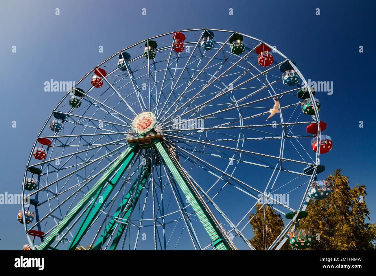 Happy family on ferris wheel hi-res stock photography and images - Alamy