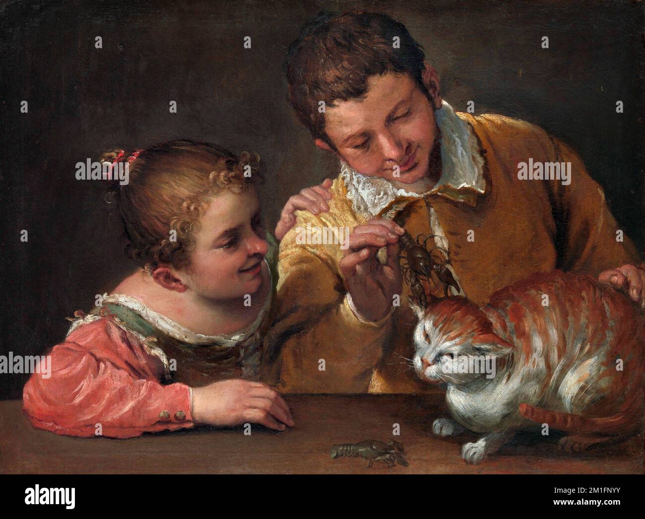 Two Children Teasing a Cat by Annibale Carracci (1560-1609), oil on canvas, c. 1587/8 Stock Photo