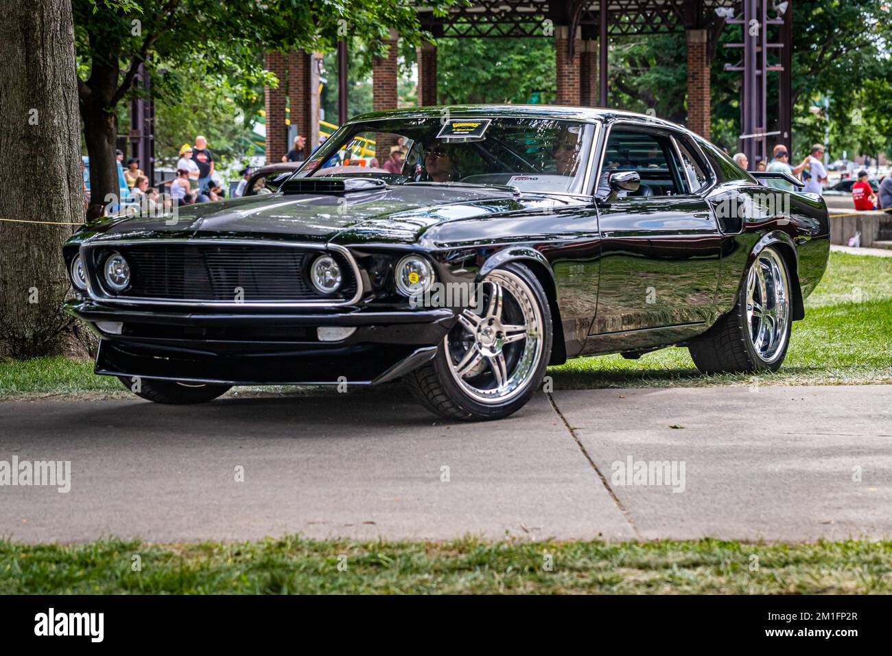 Des Moines, IA - July 03, 2022: Low perspective front corner view of a 1969 Ford Mustang Mach 1 Fastback at a local car show. Stock Photo