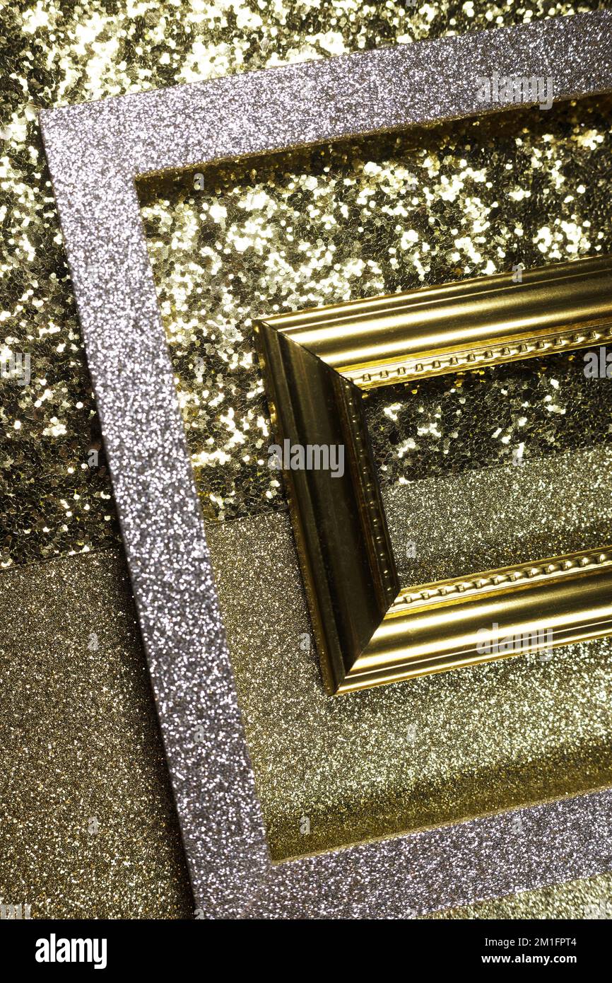 Abstract gold sparkly picture frames on gold sparkly background. Stock Photo