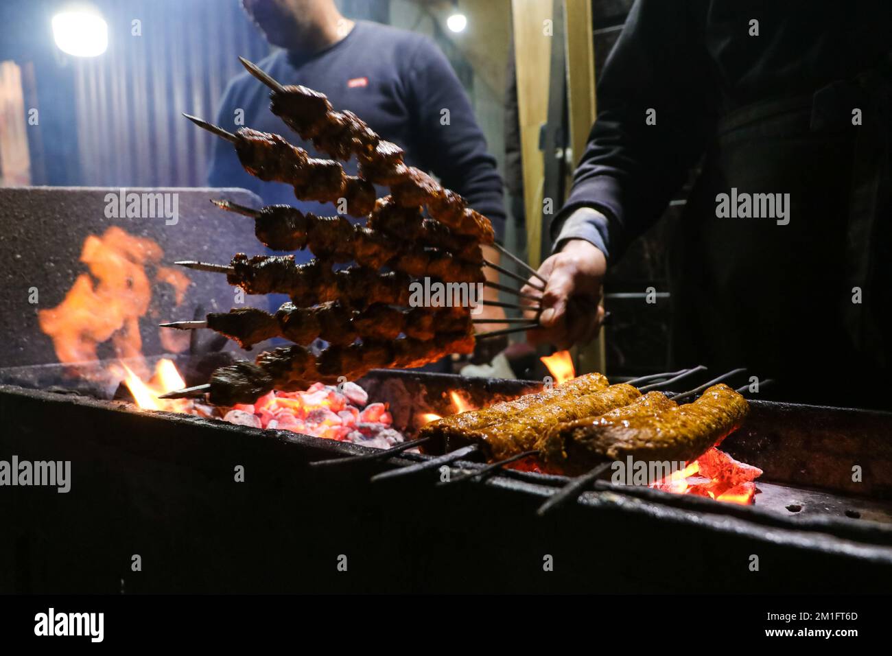 December 12, 2022, Srinagar, Jammu and Kashmir, India Man barbecues