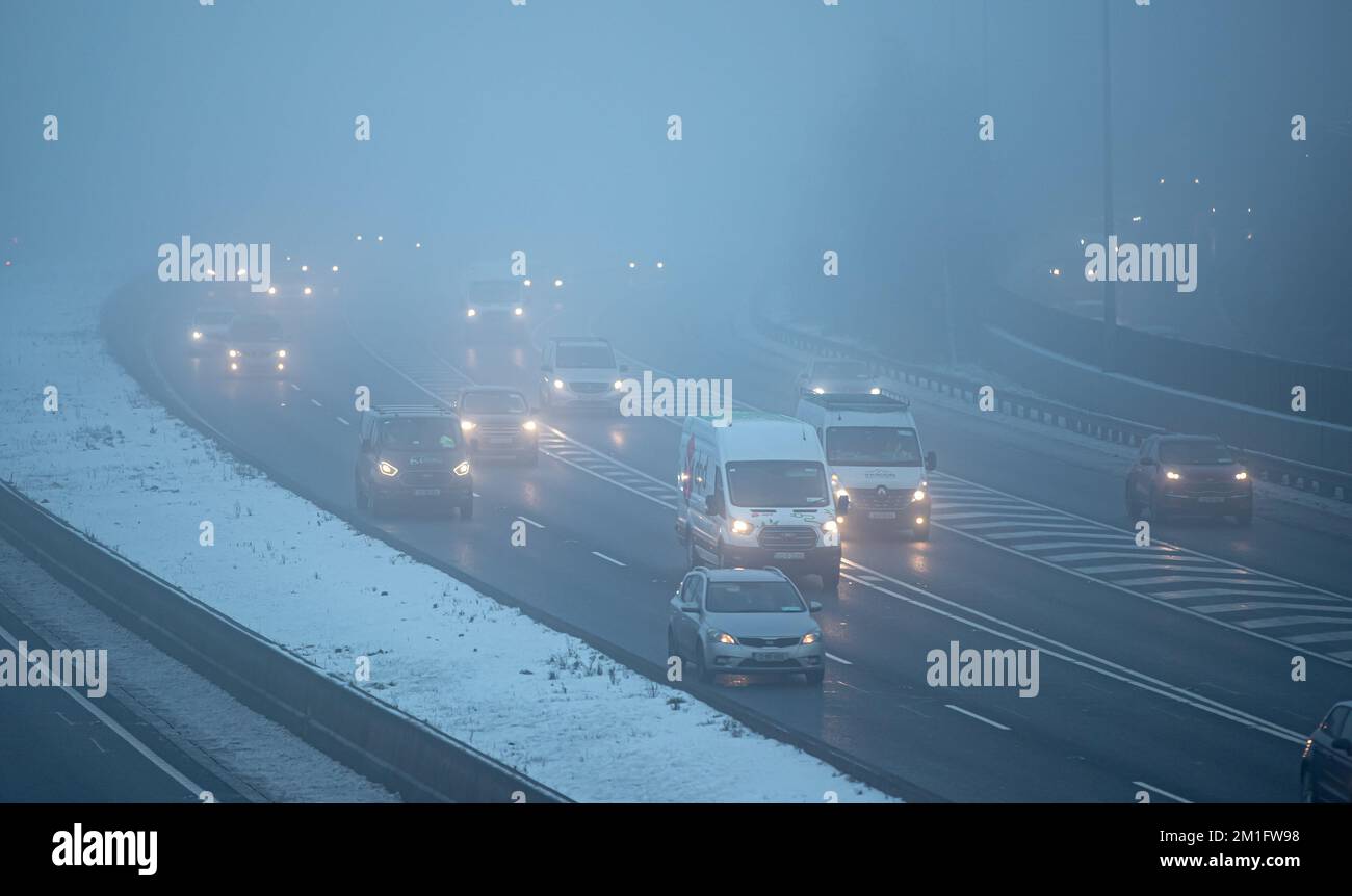 Commuters drive in freezing fog on the M50 motorway in Dublin during the current cold spell across Ireland. Picture date: Monday December 12, 2022. Stock Photo