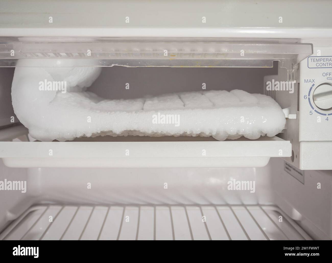 frozen Ice buildup in the freezer of refrigerator Stock Photo Alamy