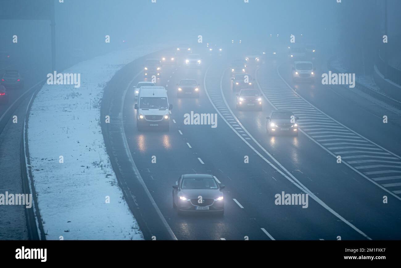 Commuters drive in freezing fog on the M50 motorway in Dublin during