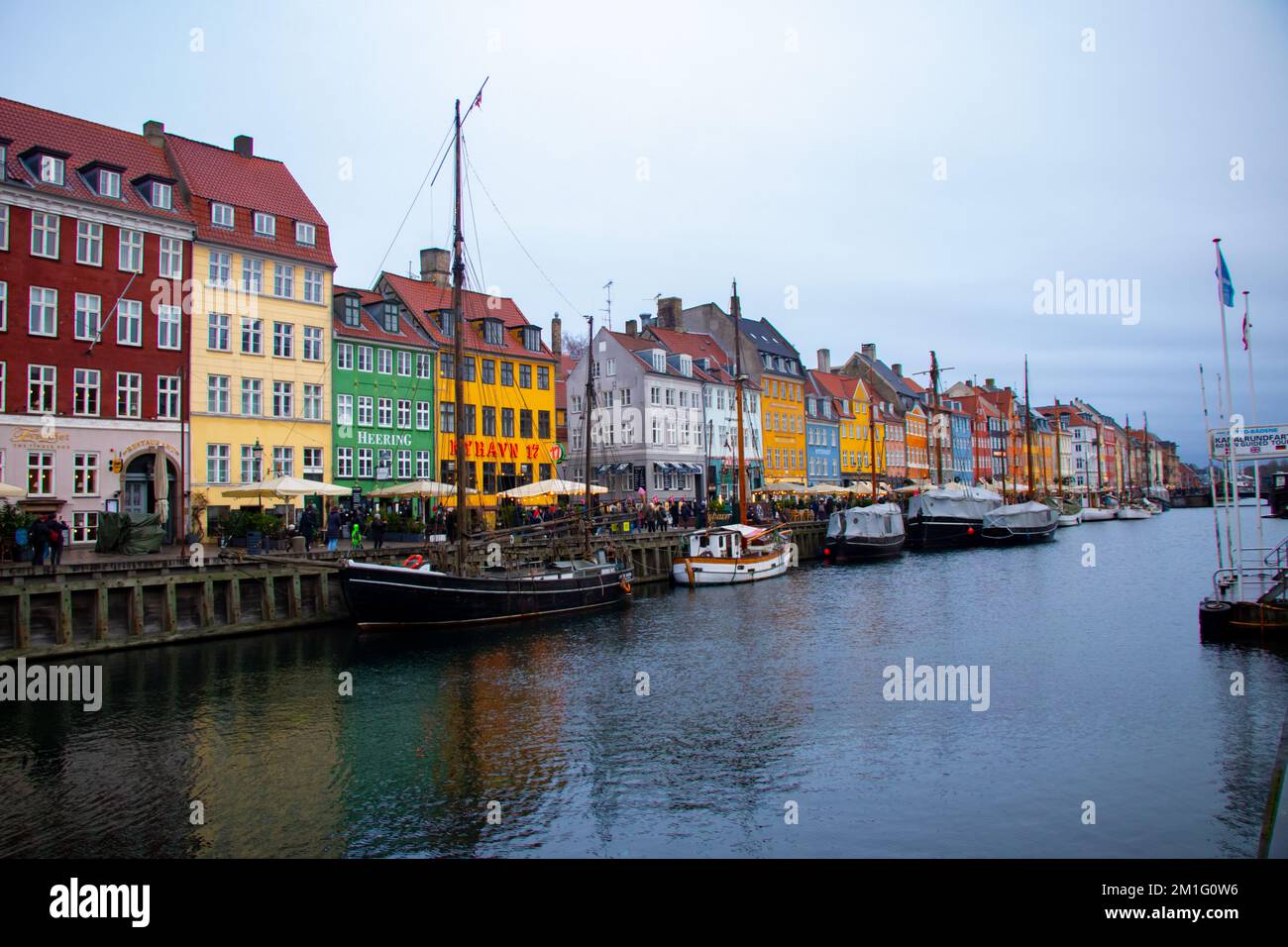 Colorful houses line the Nyhavn canal in Copenhagen, Denmark Stock Photo
