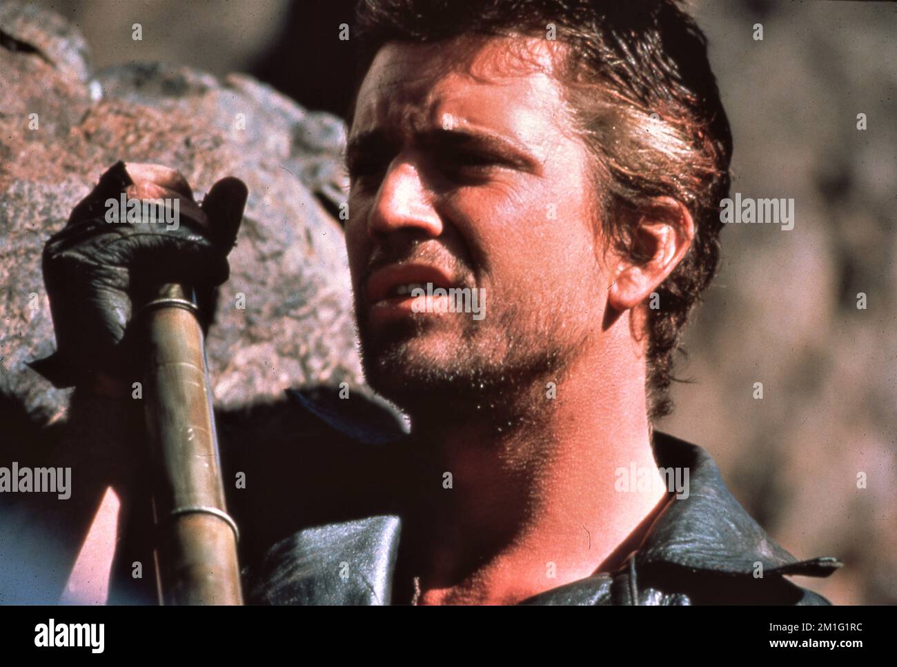 MEL GIBSON in MAD MAX 2 : THE ROAD WARRIOR 1981 director GEORGE MILLER character created by George Miller and Byron Kennedy music Brian May Kennedy Miller Productions / Warner Bros. Stock Photo