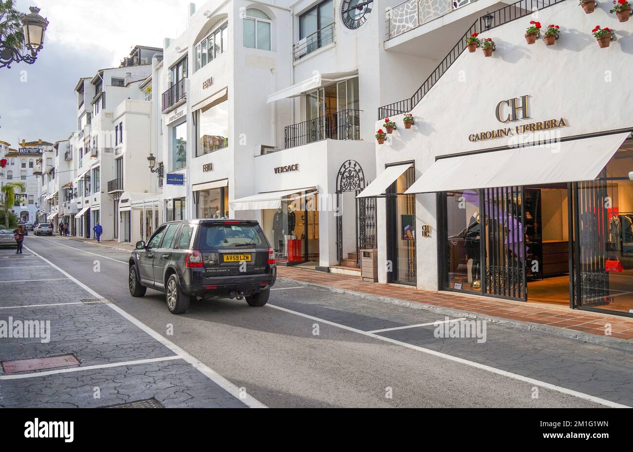 Row of high end brand shops in Puerto Banus luxury marina, Marbella, Costa del Sol, Andalucia, Spain. Stock Photo