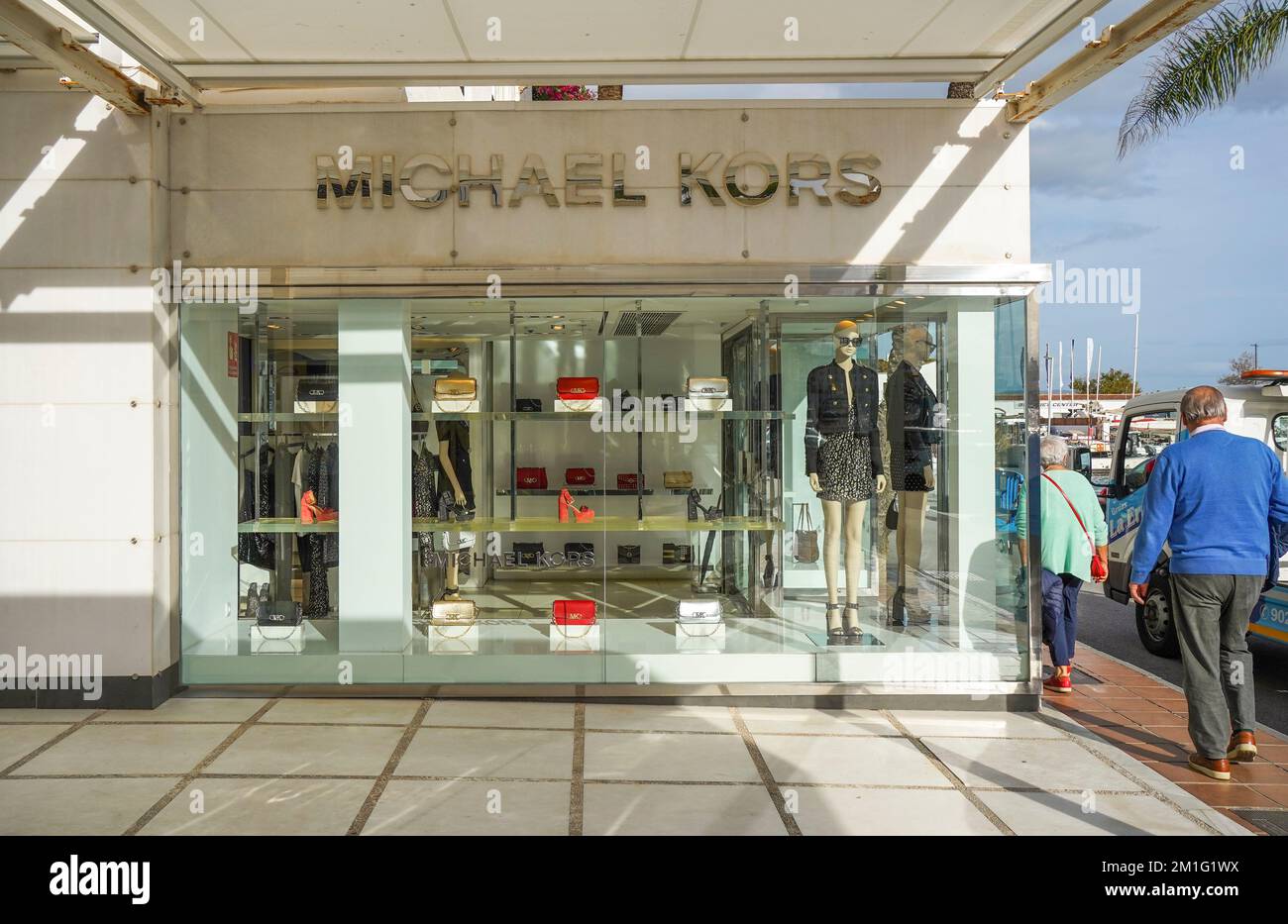 Facade Michael Kors high end brand shop in Puerto Banus luxury marina, Marbella, Costa del Sol, Andalucia, Spain. Stock Photo