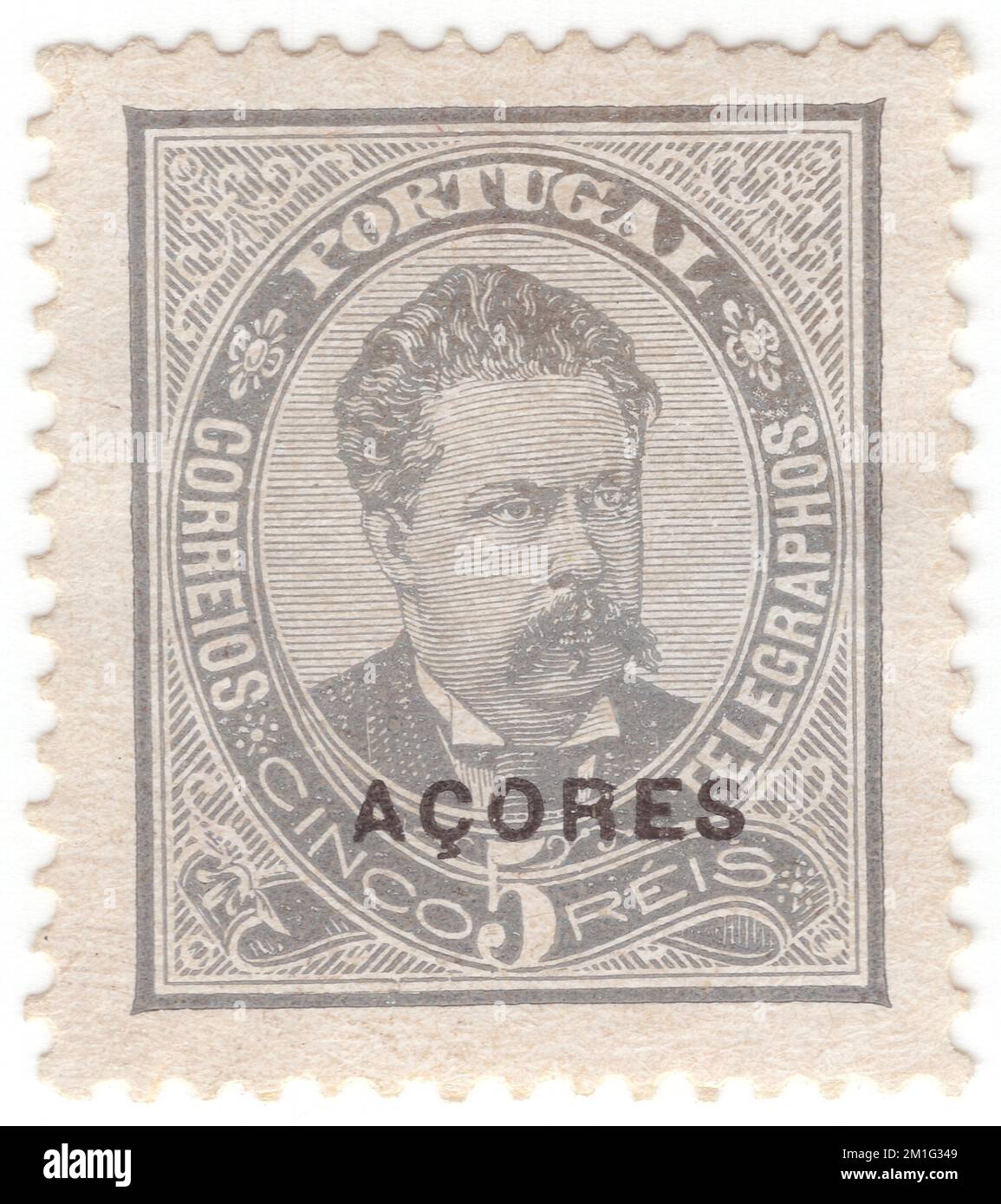 AZORES - 1882: An 5 reis slate postage stamp depicting portrait of King Luiz (Dom Luís I). Stamps of Portugal overprinted in black 'ACORES'. Dom Luís I (31 October 1838, in Lisbon – 19 October 1889, in Cascais), known as The Popular was a member of the ruling House of Braganza, and King of Portugal from 1861 to 1889. The second son of Queen Maria II and her consort, King Ferdinand, he acceded to the throne upon the death of his elder brother King Pedro V. Luís was a cultured man who wrote vernacular poetry, but had no distinguishing gifts in the politics Stock Photo
