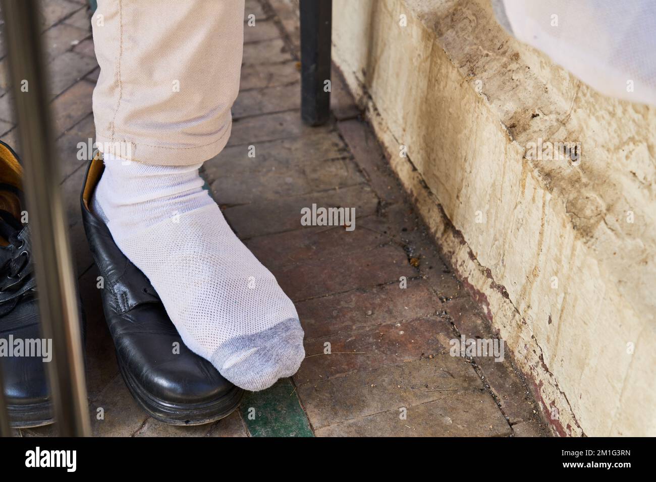 black shoes and white socks in a comfortable situation Stock Photo Alamy