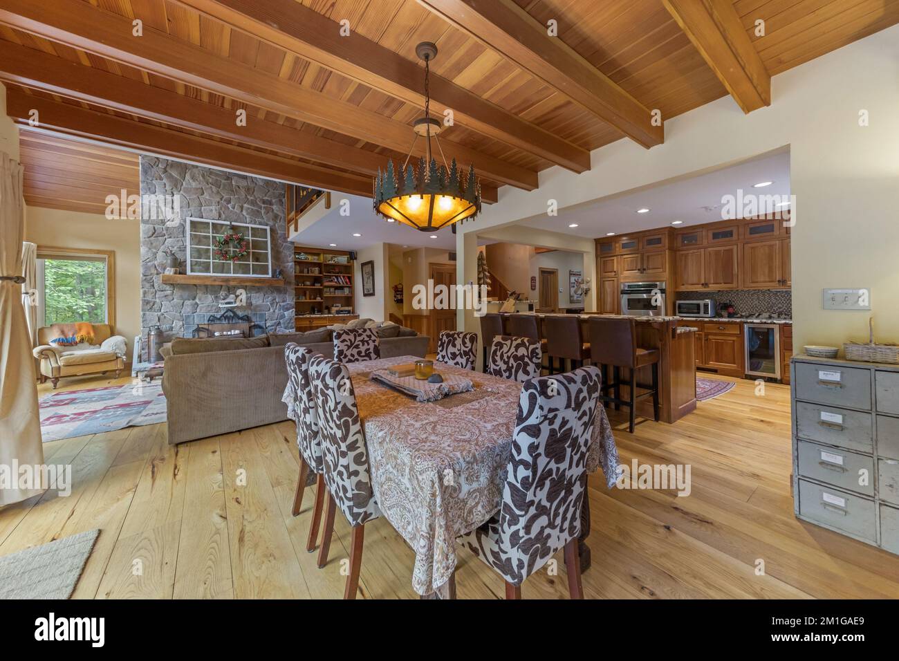 An interior shot of a cozy dining room with wooden details Stock Photo ...