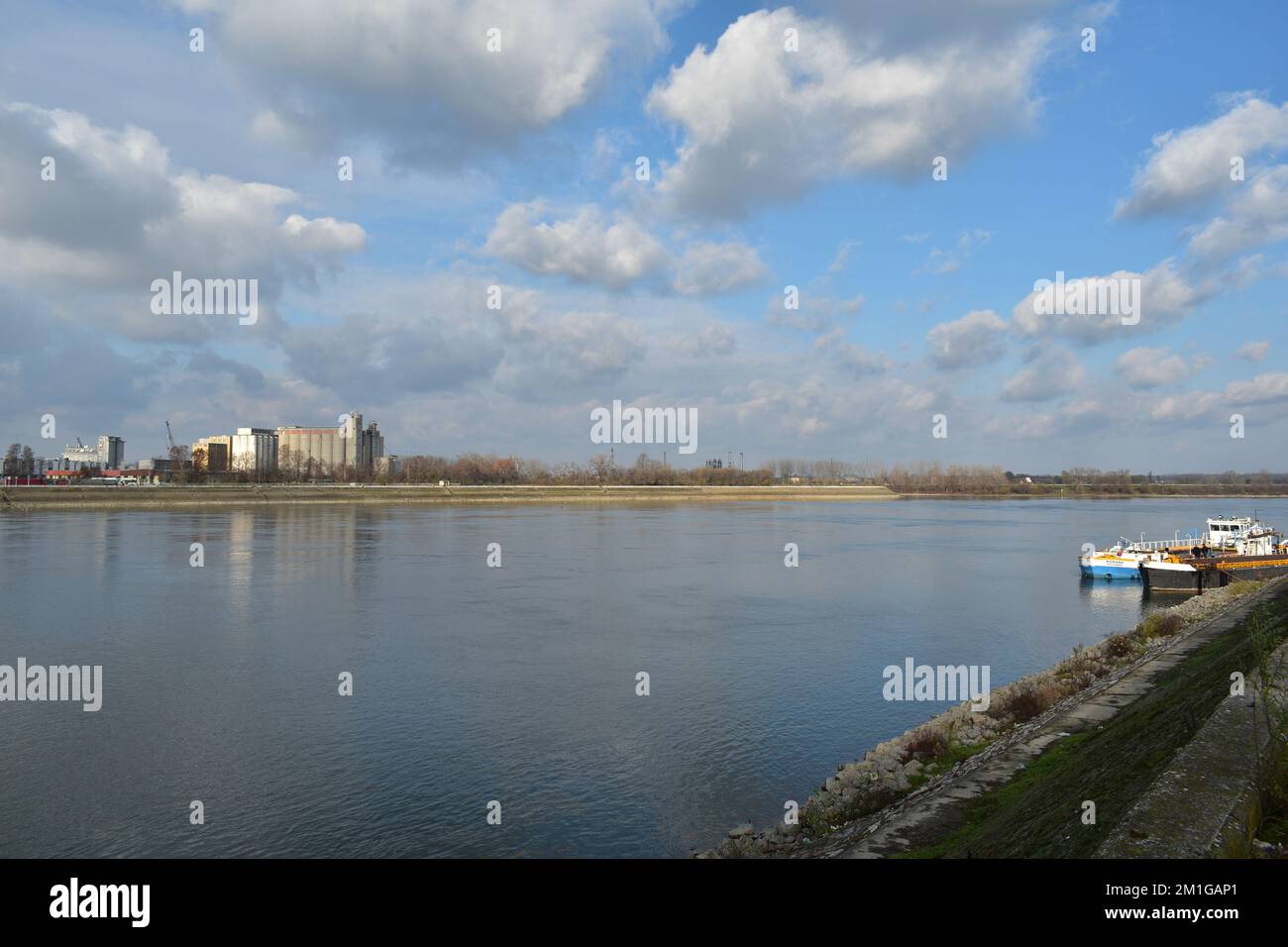 Panorama of Danube quay in Novi Sad with a view of industrial zone in