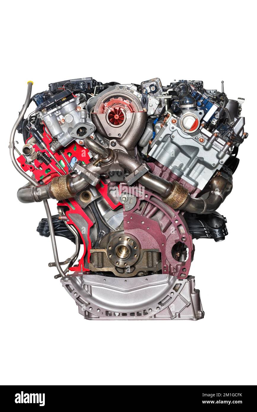 The design of the internal combustion engine of a modern car on a stand showing a section of