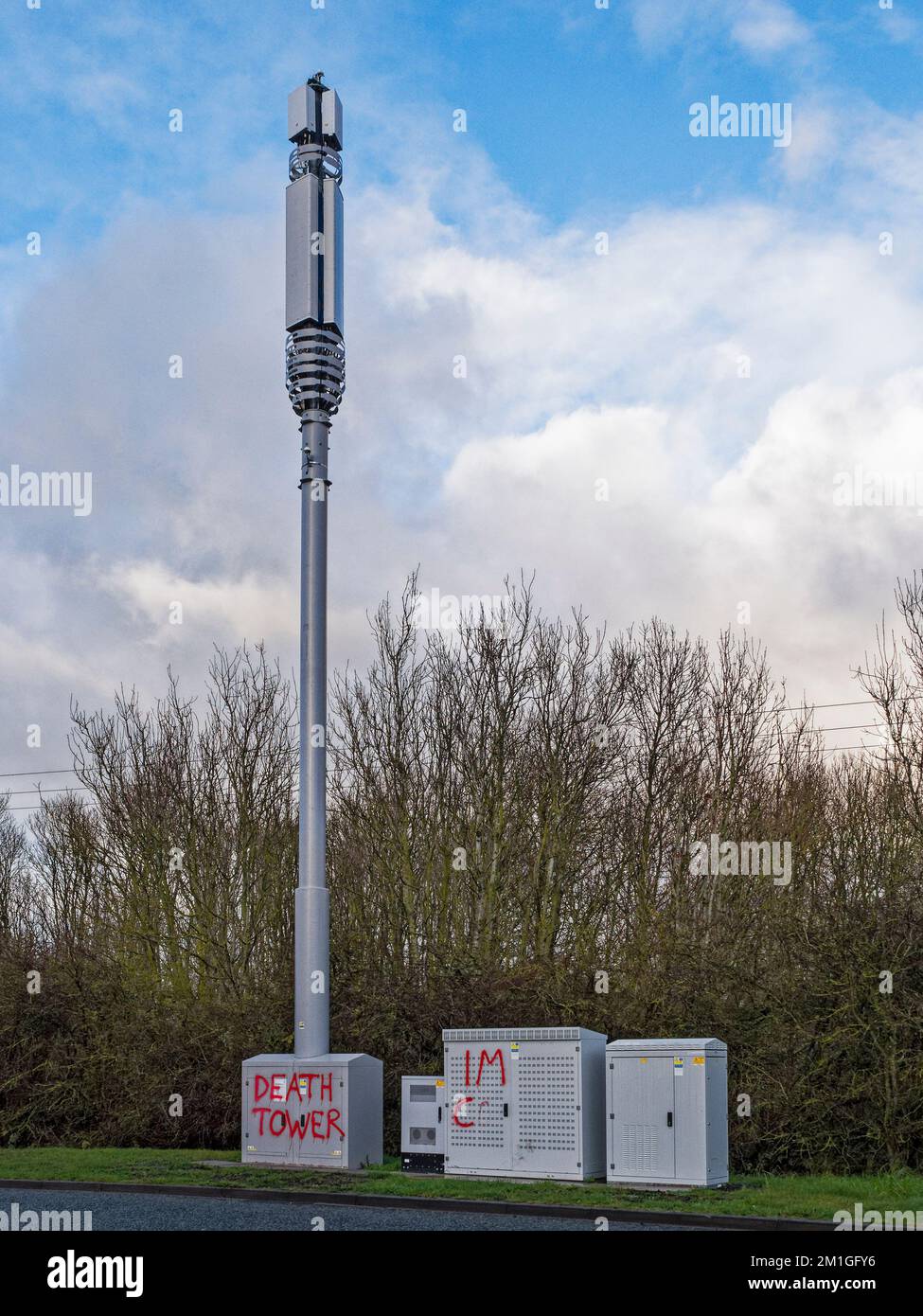 UK cell tower with graffiti Stock Photo