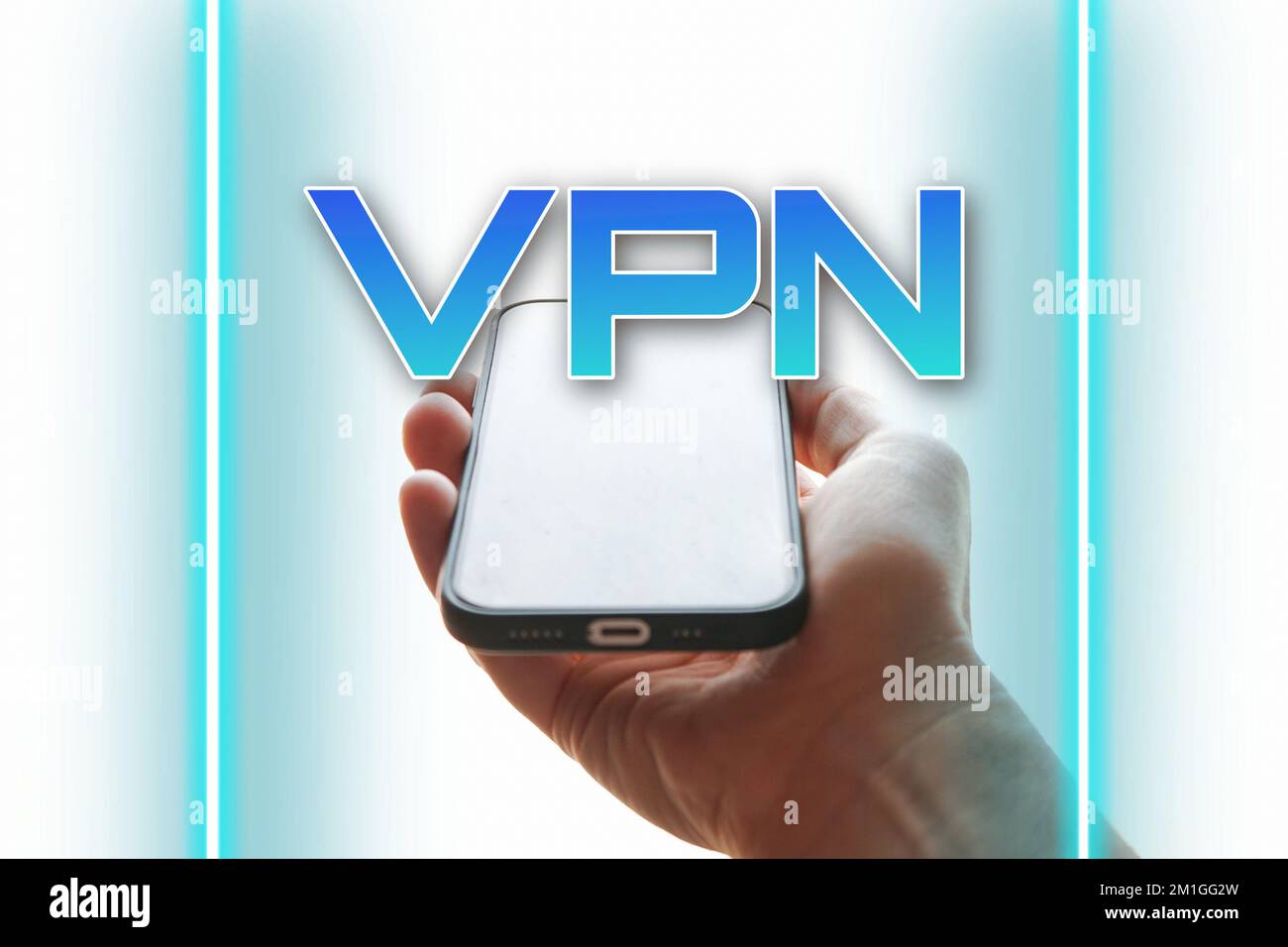 hand holding a smart phone with vpn icon Stock Photo