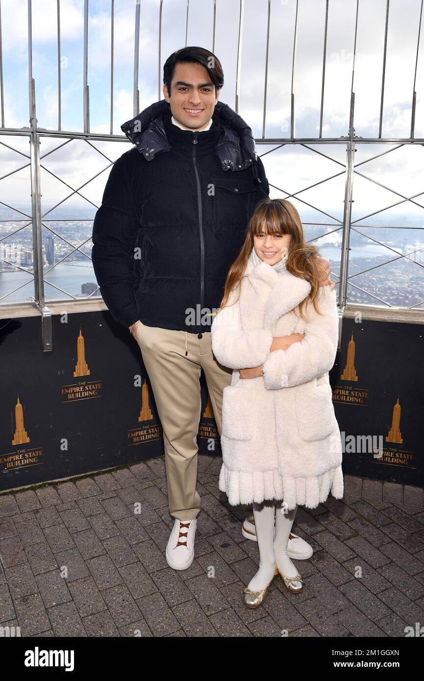 New York, USA. 12th Dec, 2022. (L-R) Matteo Bocelli and Virginia Bocelli pose on the 86th floor observation deck as they attend the ceremonial lighting of the Empire State Building in honor of the Andrea Bocelli Foundation's 'Voices of' charity, New York, NY, December 12, 2022. (Photo by Anthony Behar/Sipa USA) Credit: Sipa USA/Alamy Live News Stock Photo