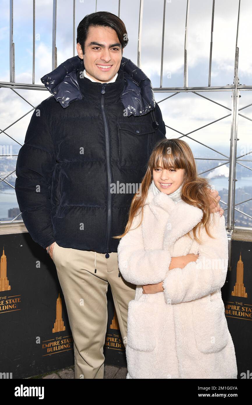 New York, USA. 12th Dec, 2022. (L-R) Matteo Bocelli and Virginia Bocelli pose on the 86th floor observation deck as they attend the ceremonial lighting of the Empire State Building in honor of the Andrea Bocelli Foundation's 'Voices of' charity, New York, NY, December 12, 2022. (Photo by Anthony Behar/Sipa USA) Credit: Sipa USA/Alamy Live News Stock Photo