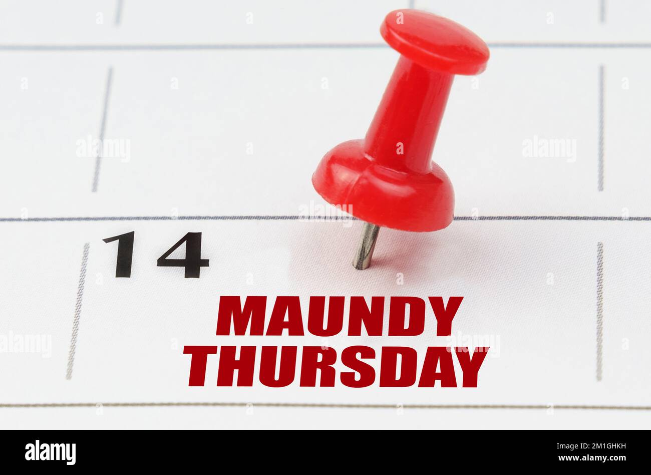 International holidays. On the calendar grid, the date and name of the holiday - Maundy Thursday Stock Photo