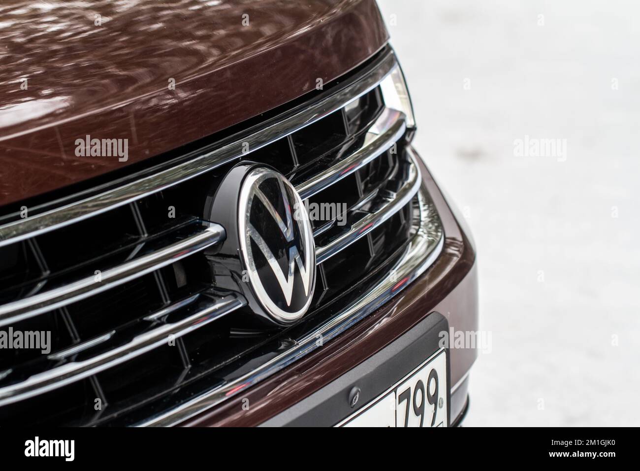 MOSCOW, RUSSIA - JANUARY 22, 2022. Volkswagen Tiguan (AD1) subcompact luxury SUV car, front-side view. Volkswagen Group close-up logo. Stock Photo
