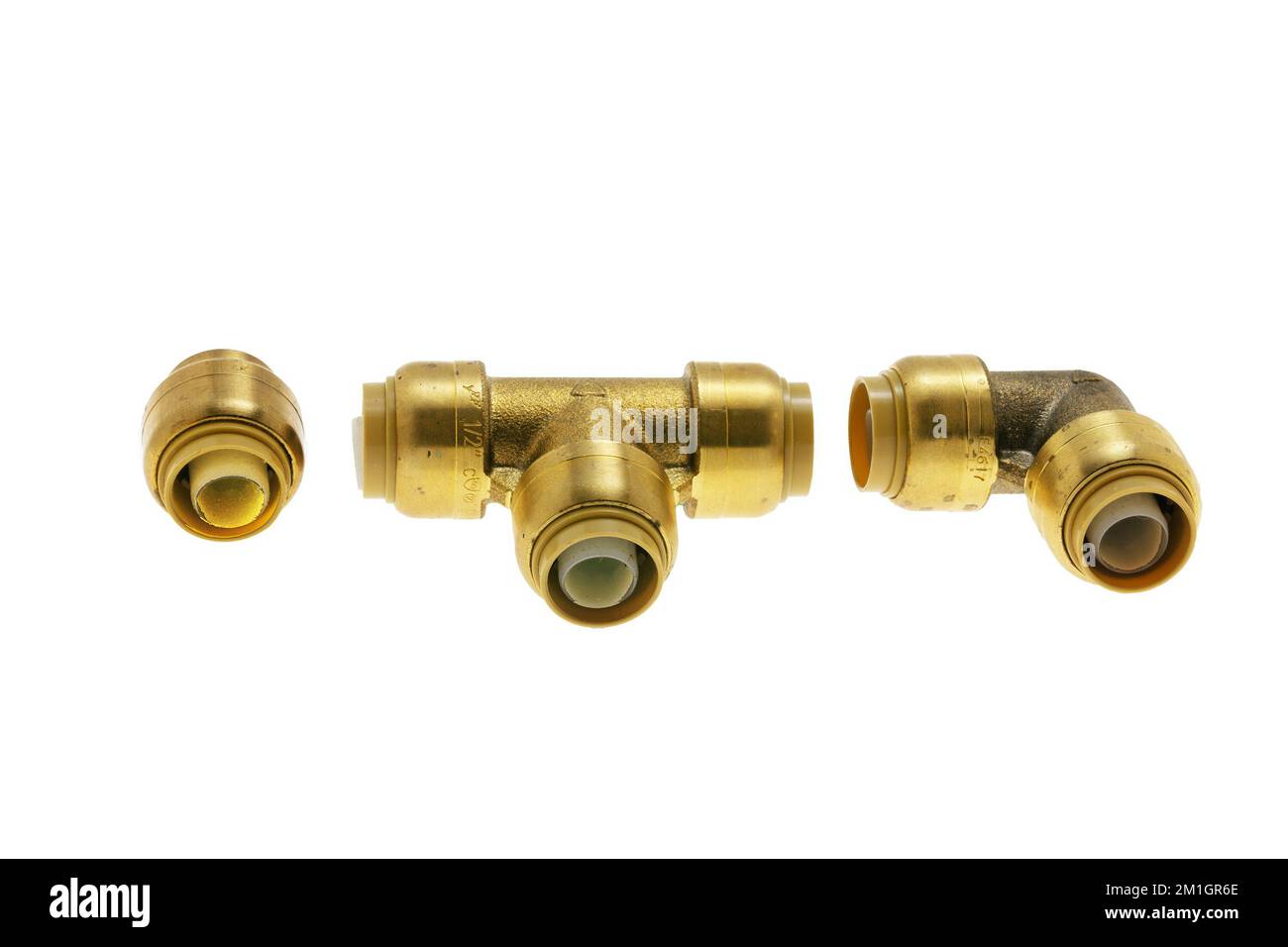 Bronze angle fittings for the work of a plumber  on a  white  background Stock Photo