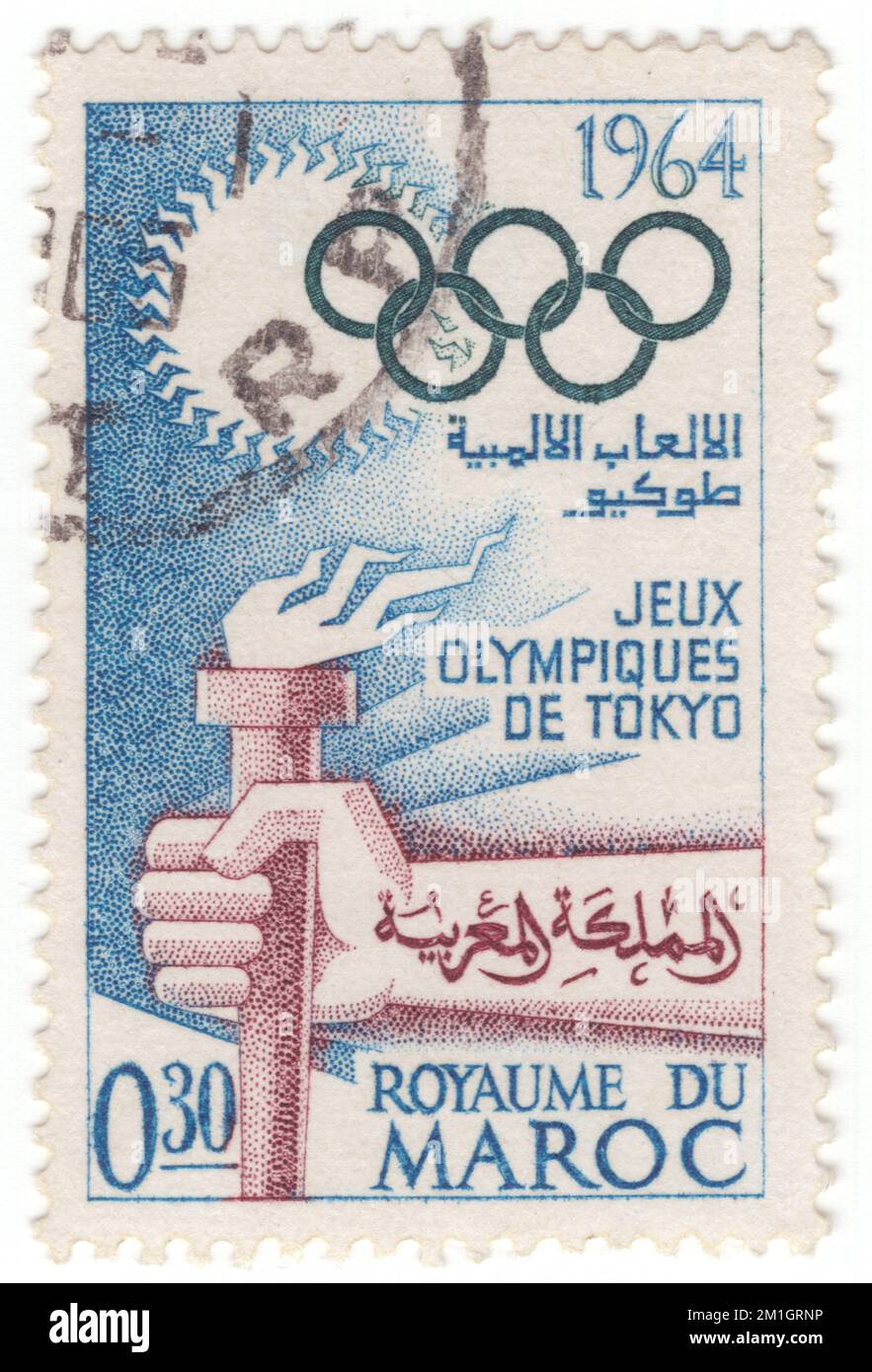 MOROCCO - 1964 September 22: An 30 centimes blue, dark green and red-brown postage stamp depicting Olympic Torch. 18th Olympic Games, Tokyo, October 10-25. The 1964 Summer Olympics, officially the Games of the XVIII Olympiad and commonly known as Tokyo 1964, were an international multi-sport event held from 10 to 24 October 1964 in Tokyo, Japan. Tokyo had been awarded the organization of the 1940 Summer Olympics, but this honor was subsequently passed to Helsinki due to Japan's invasion of China, before ultimately being cancelled due to World War II Stock Photo