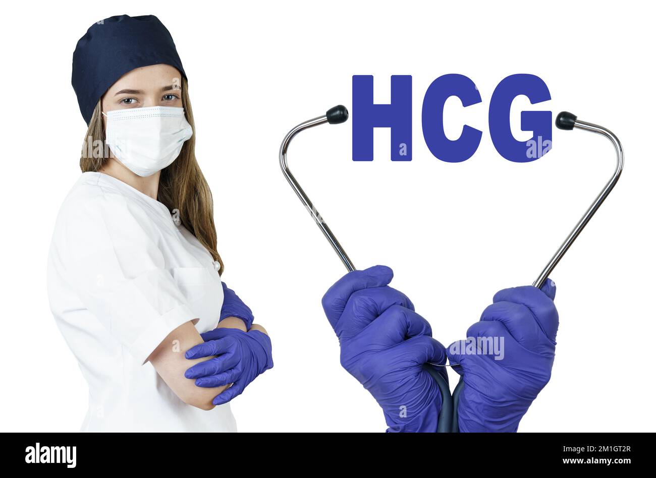 Health care and medicine concept. The doctor is holding a stethoscope, in the middle there is a text - HCG. Human Chorionic Gonadotropin Stock Photo