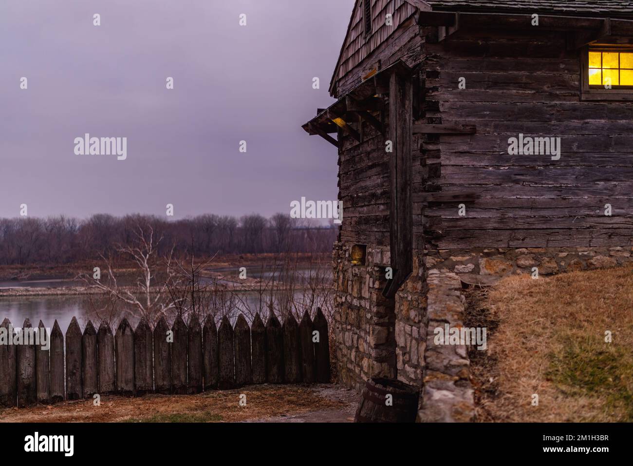 The exterior of a wooden cabin near the Missouri River in Fort Osage