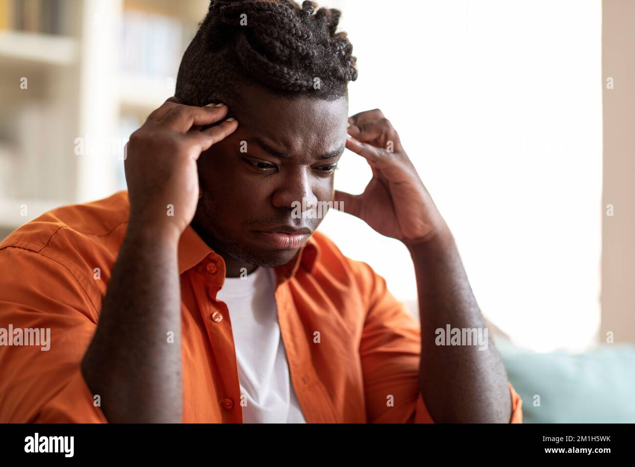 Upset african man hi-res stock photography and images - Alamy