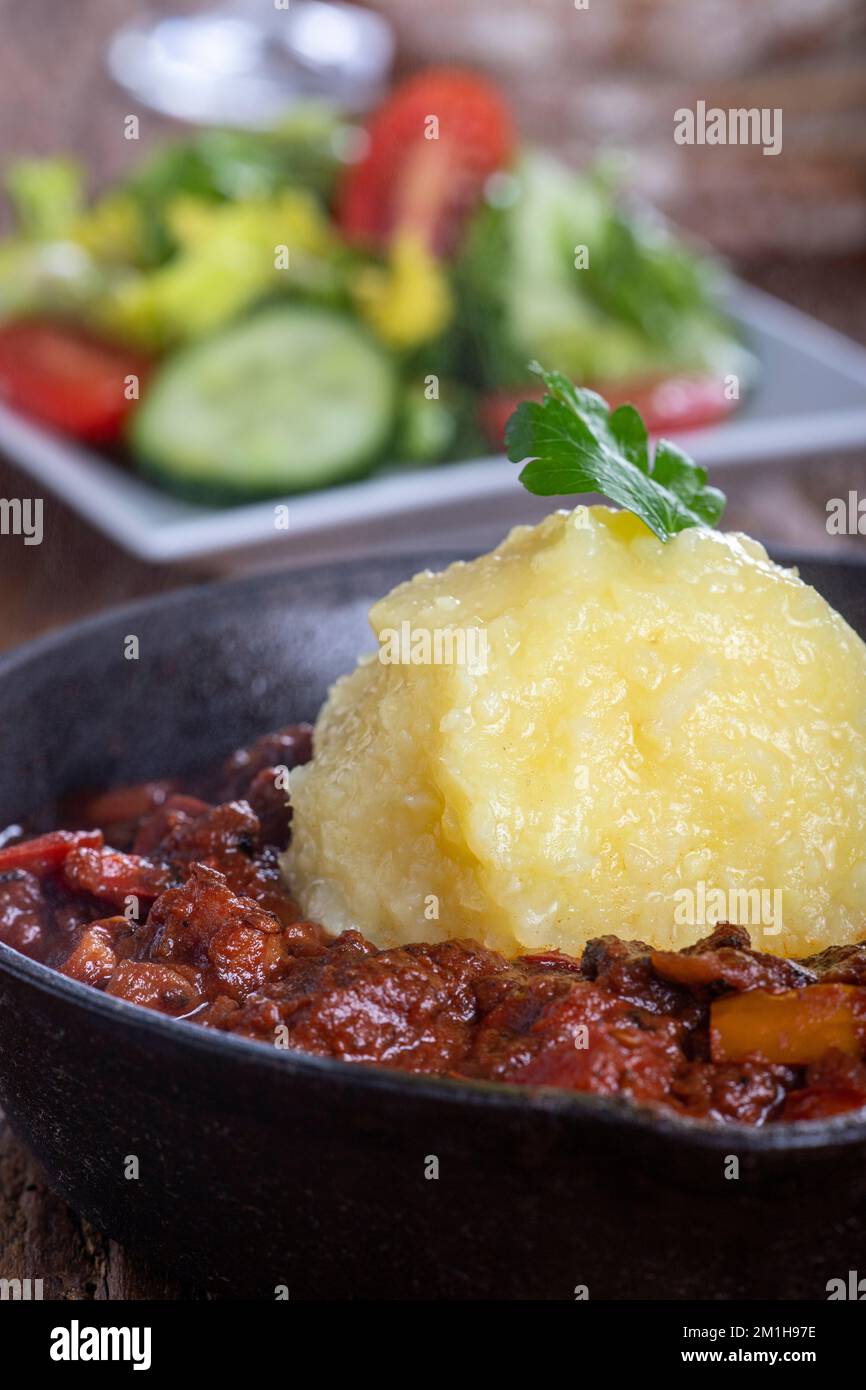hungarian goulash with a potato dumpling Stock Photo Alamy