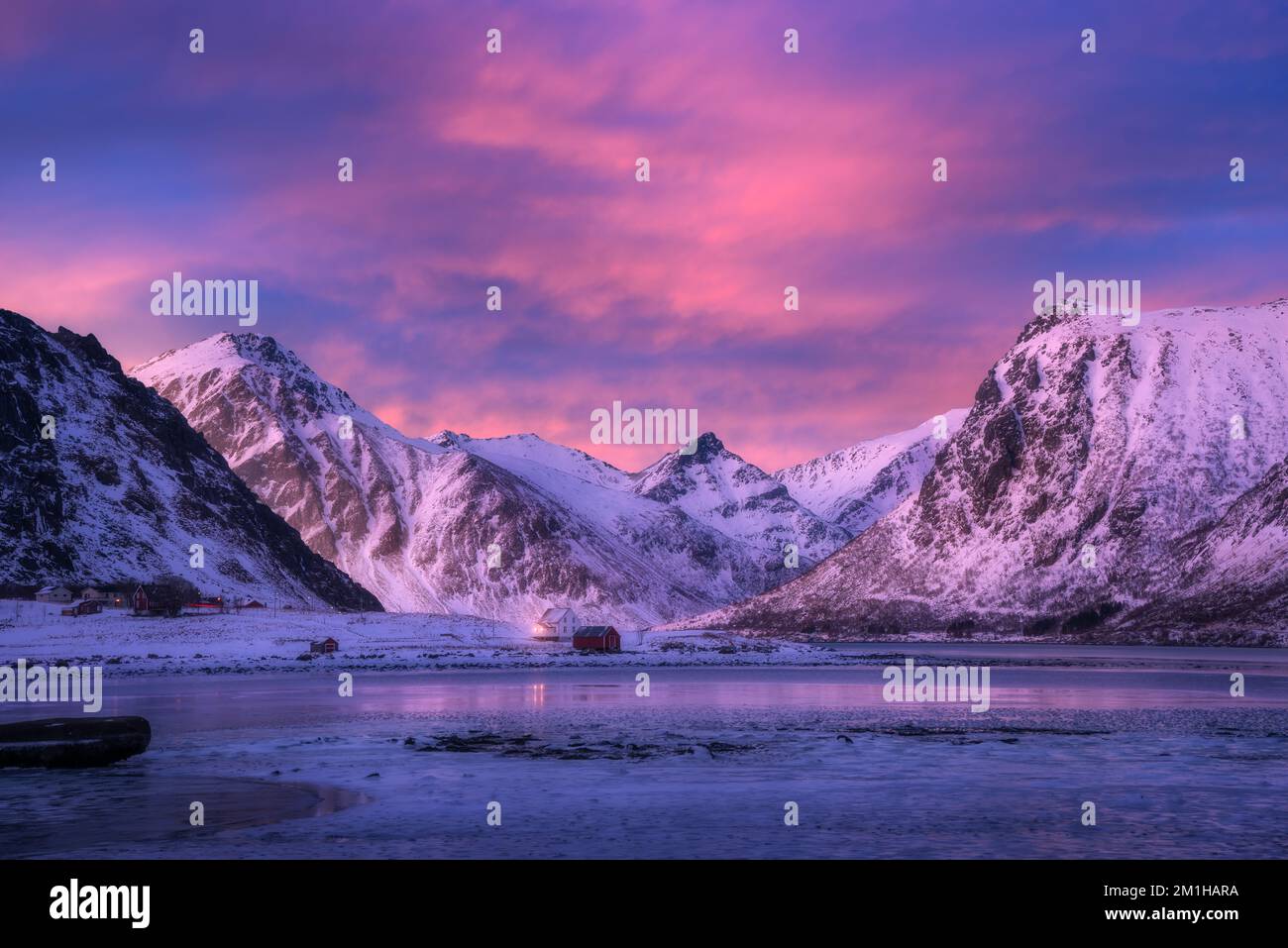 Beautiful snow covered mountains and blue sky with pink clouds Stock ...