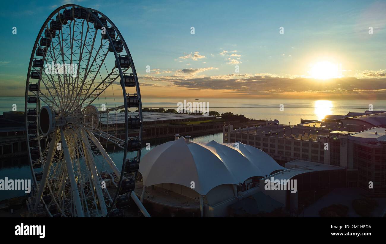 Navy Pier ferris wheel at sunrise in Chicago Stock Photo