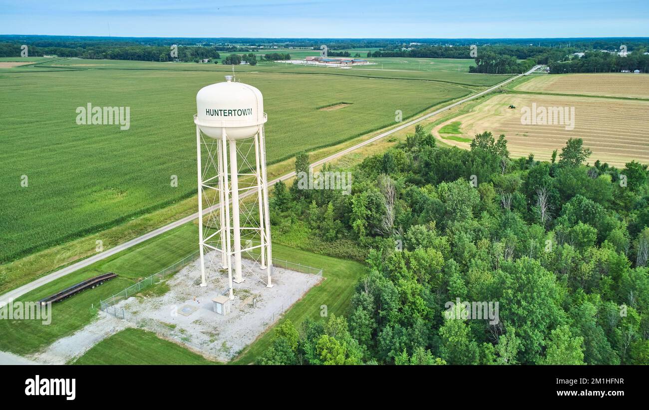 Huntertown, Indiana water tower utility aerial surrounded by corn