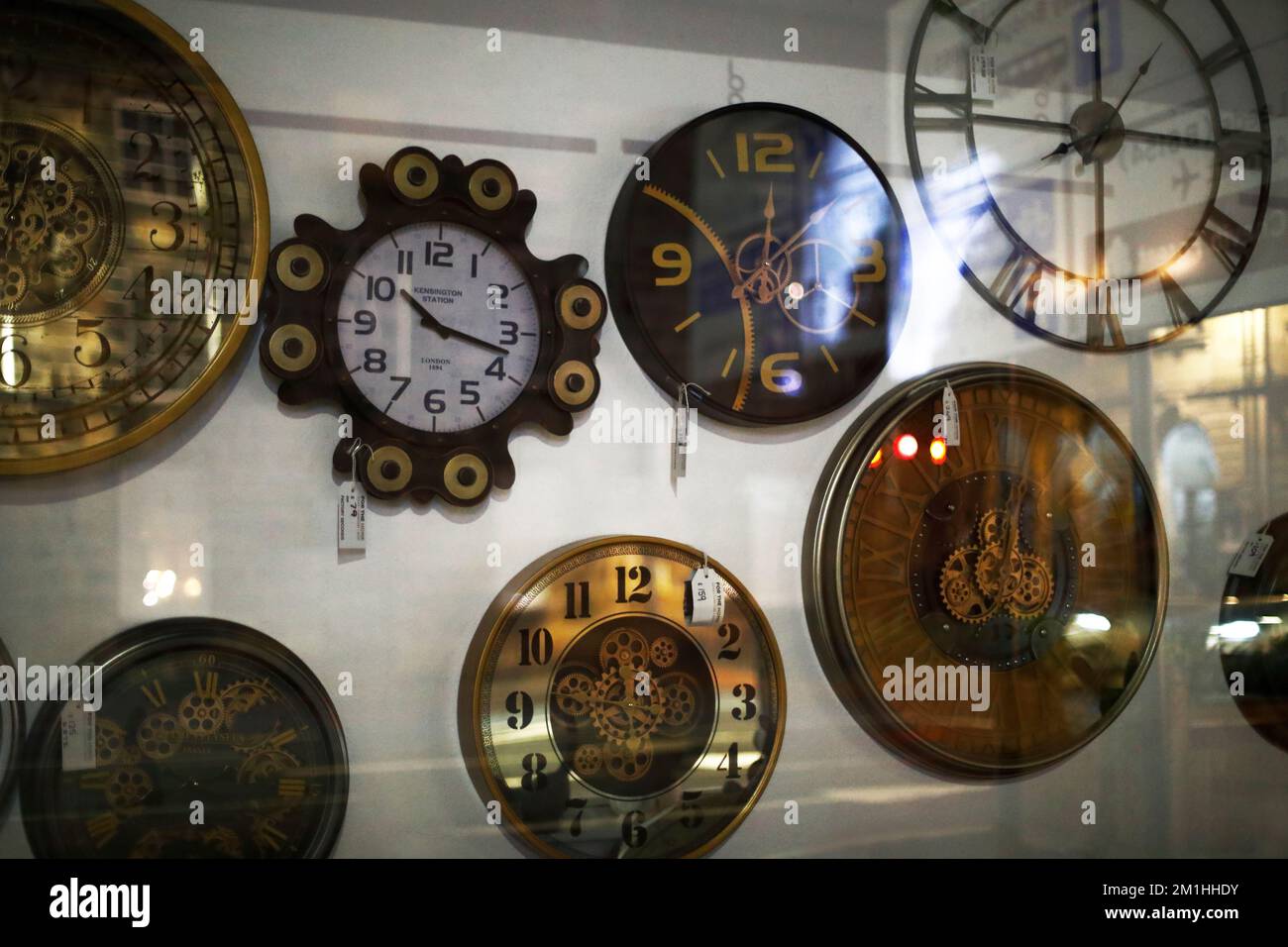Shop Window selling wall clocks Stock Photo Alamy