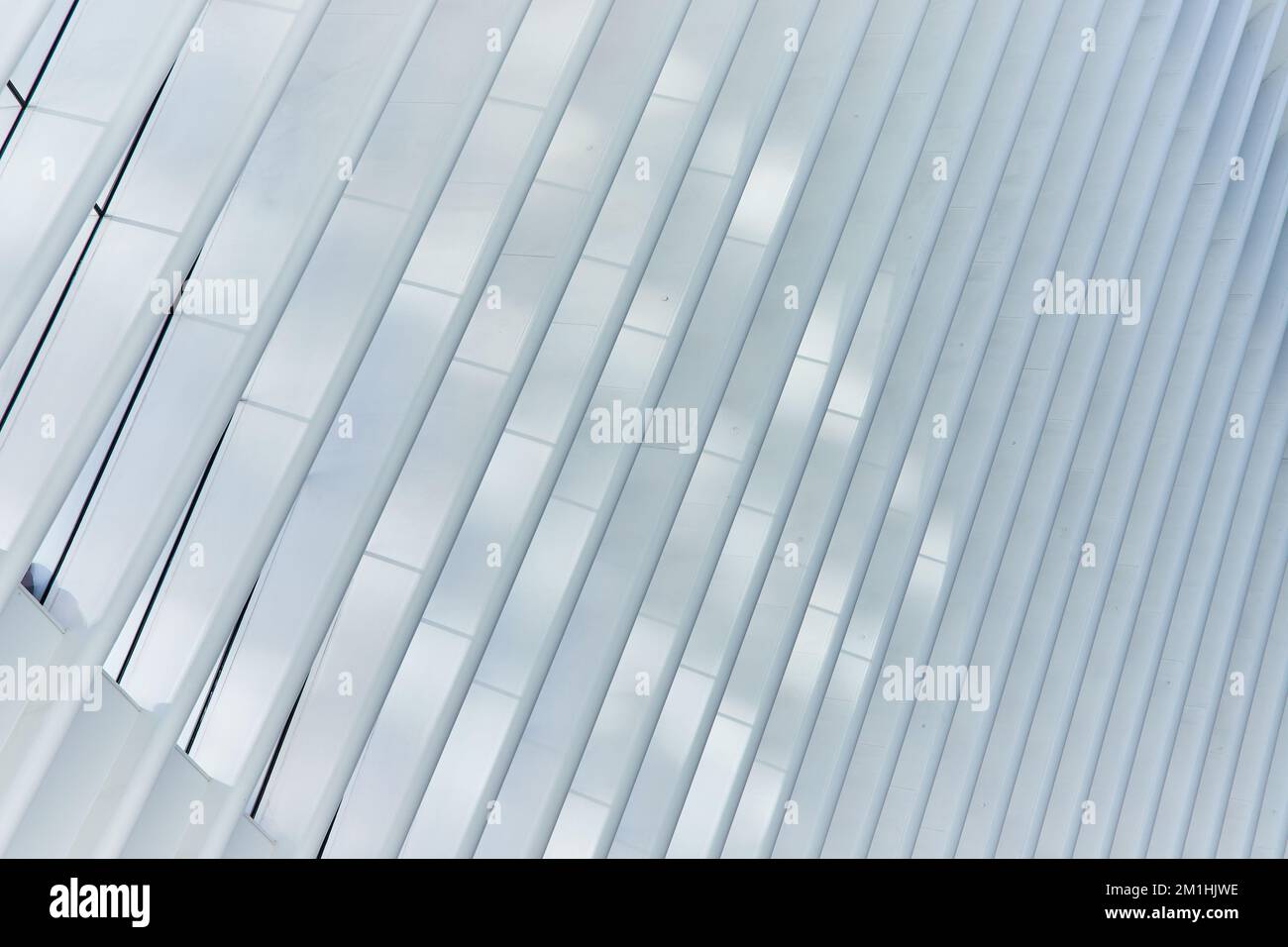 Clean abstract white rib pole architecture at angle with soft light Stock Photo