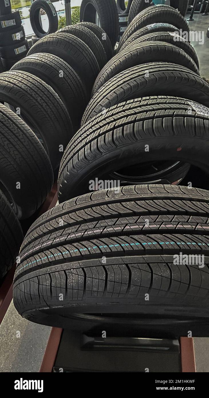 New automobile tires on display at a tire dealership Stock Photo Alamy