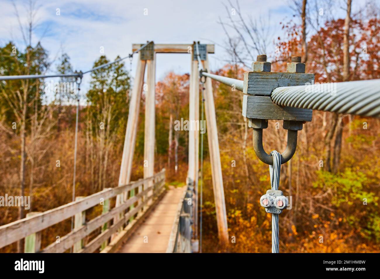 Detail of support ropes for large suspension bridge leading into fall