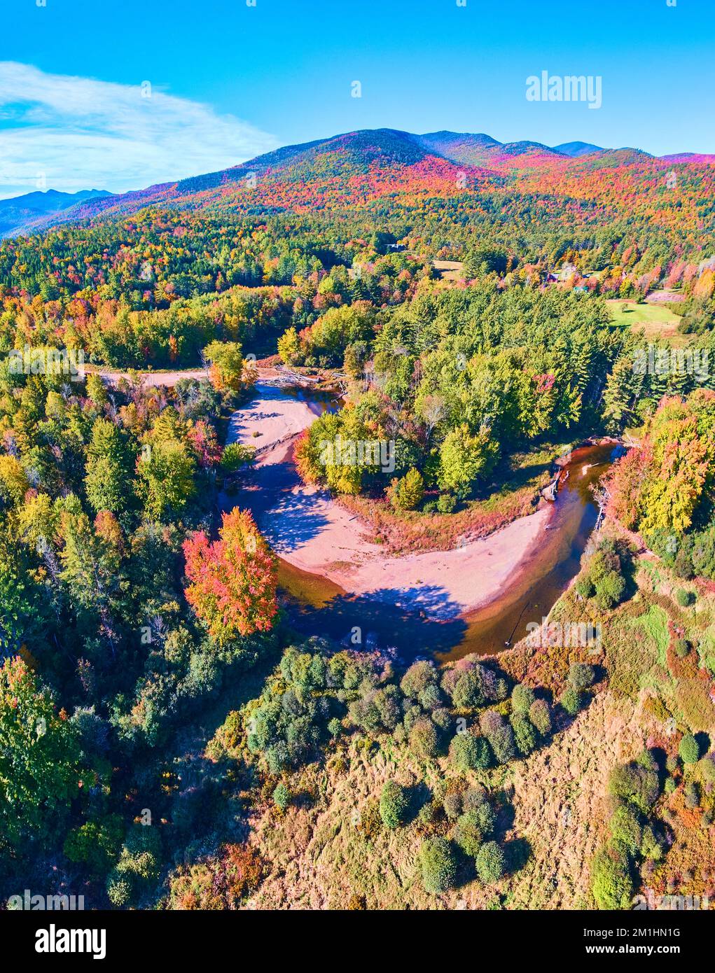 River winding through lush forests and mountains of New York in peak fall Stock Photo Alamy