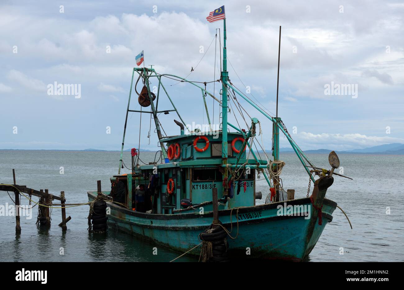 A fishing boat operated by the indigenous Rungus people in Kudat harbour on the Sulu Sea. Sabah, Borneo, Malaysia. Stock Photo