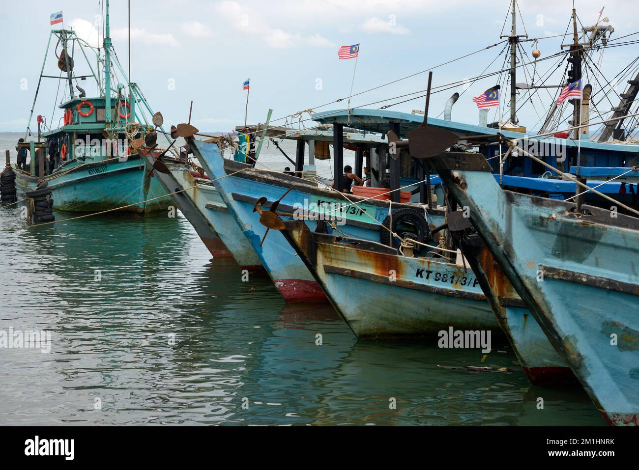 Fishing boats operated by the indigenous Rungus people in Kudat harbour on the Sulu Sea. Sabah, Borneo, Malaysia. Stock Photo