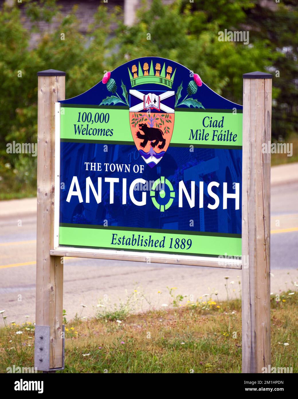 Antigonish, Canada - August 1, 2022: Town sign at the entrance of Antigonish, Nova Scotia, the home of St. Francis Xavier University. The sign transla Stock Photo